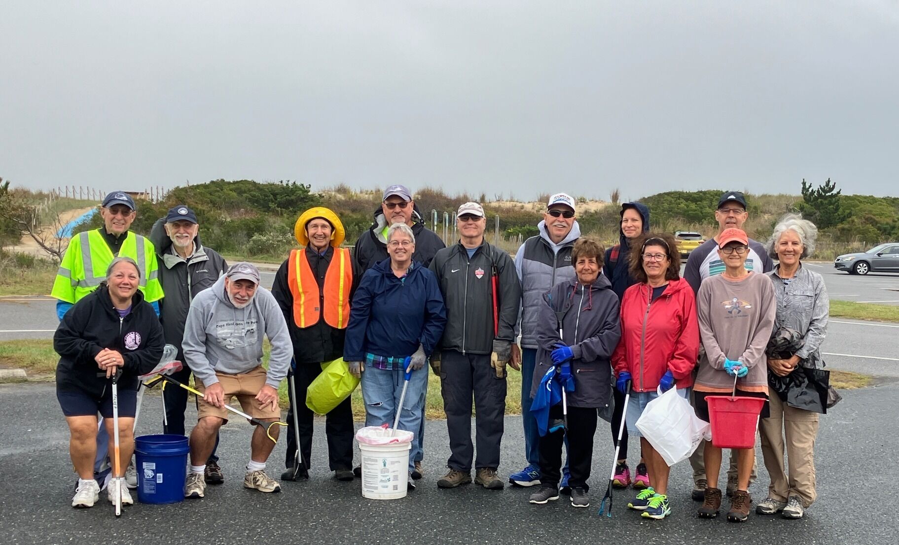 Volunteers clean trails at Cape Henlopen State Park despite rainy weather